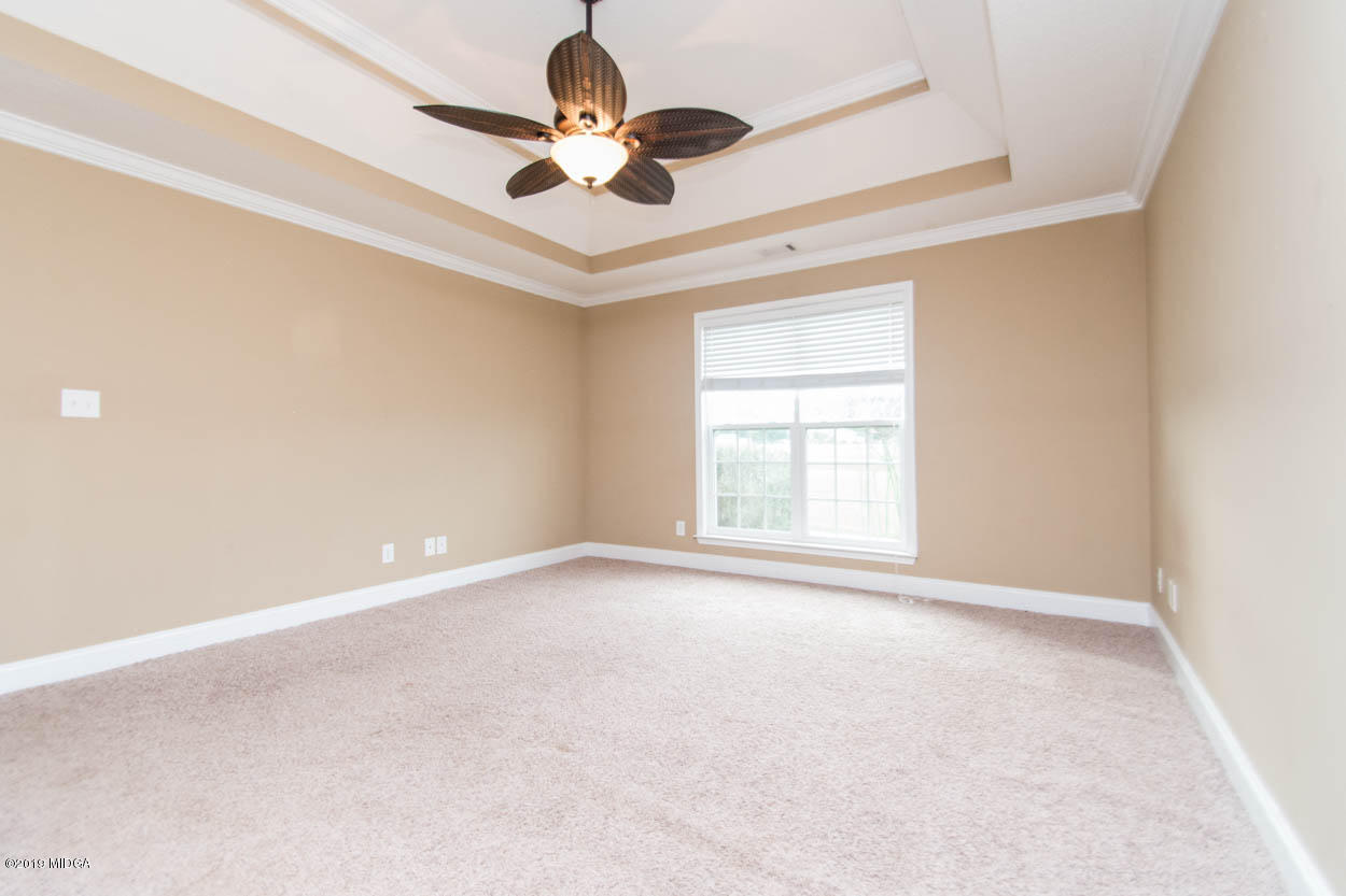 2725 Moseley Road Byron, GA 31008 - Photo 12 of 34 en view of an empty room with a window