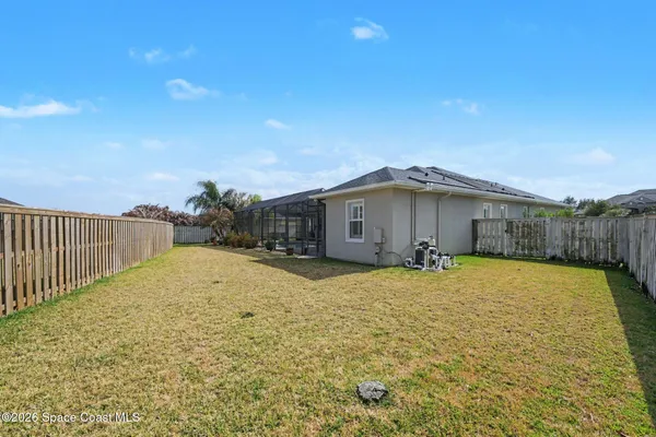 a bathroom with a sink and a yard