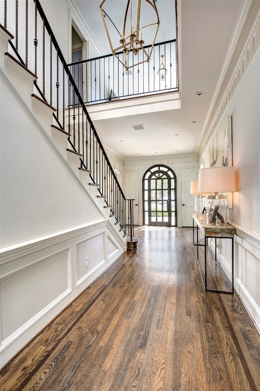 3440 Locke Lane Houston, TX 77027 - Photo 13 of 21 a view of staircase with wooden floor and a large window