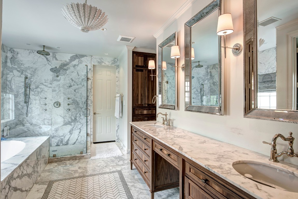 3440 Locke Lane Houston, TX 77027 - Photo 15 of 21 a bathroom with a granite countertop double vanity sink a mirror and a shower