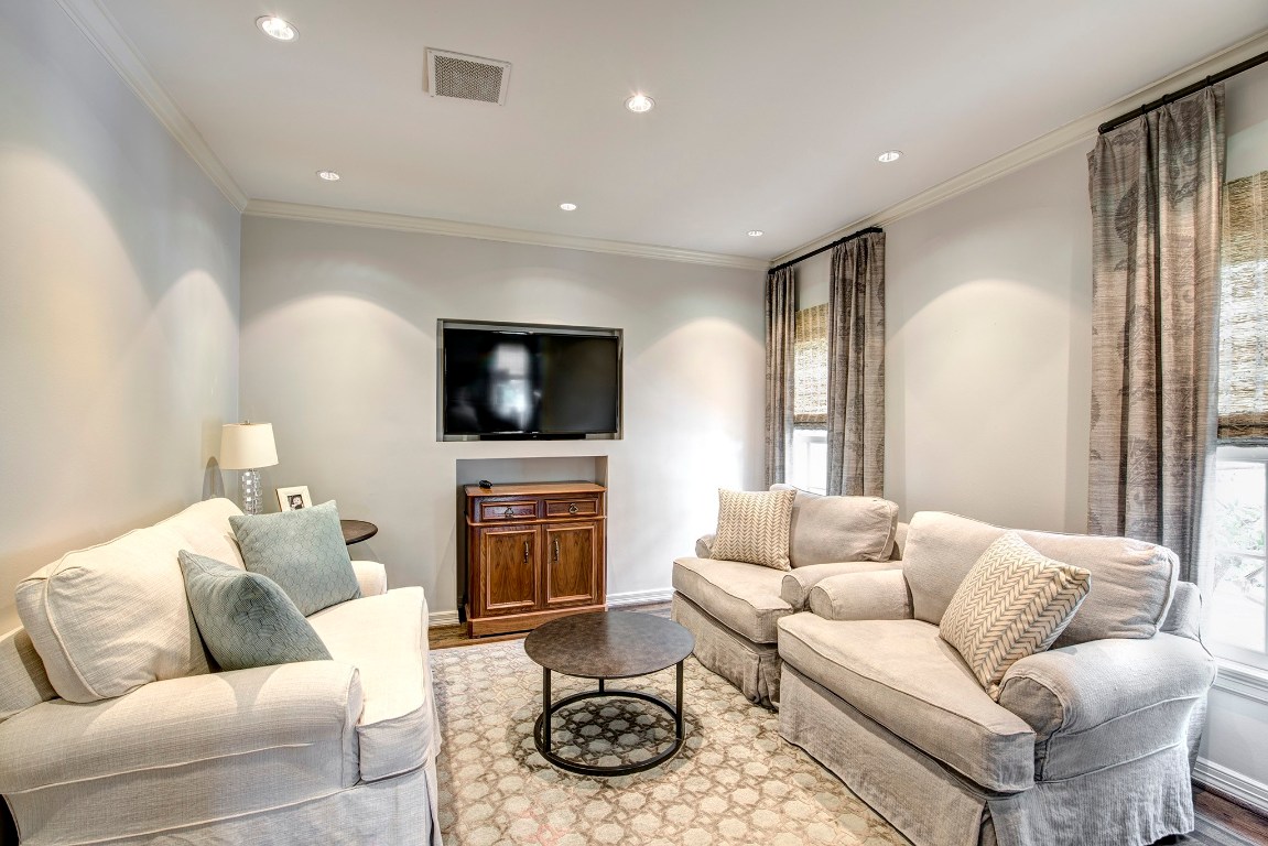 3440 Locke Lane Houston, TX 77027 - Photo 20 of 21 a living room with furniture and a flat screen tv