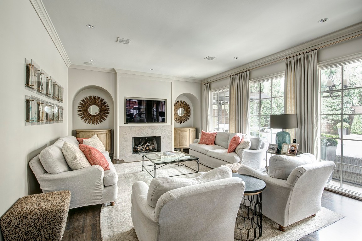 3440 Locke Lane Houston, TX 77027 - Photo 3 of 21 a living room with fireplace furniture and a large window