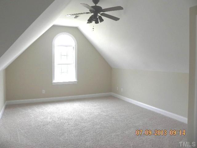 213 Waterville Street Raleigh, NC 27603 - Photo 19 of 24 an empty room with windows and fan