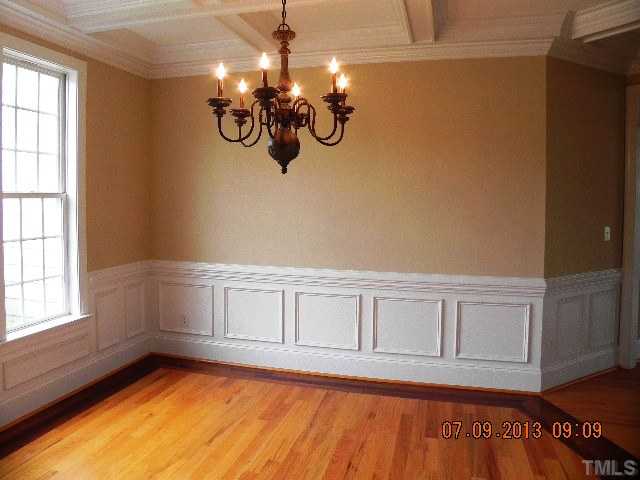 213 Waterville Street Raleigh, NC 27603 - Photo 4 of 24 a view of a livingroom with wooden floor
