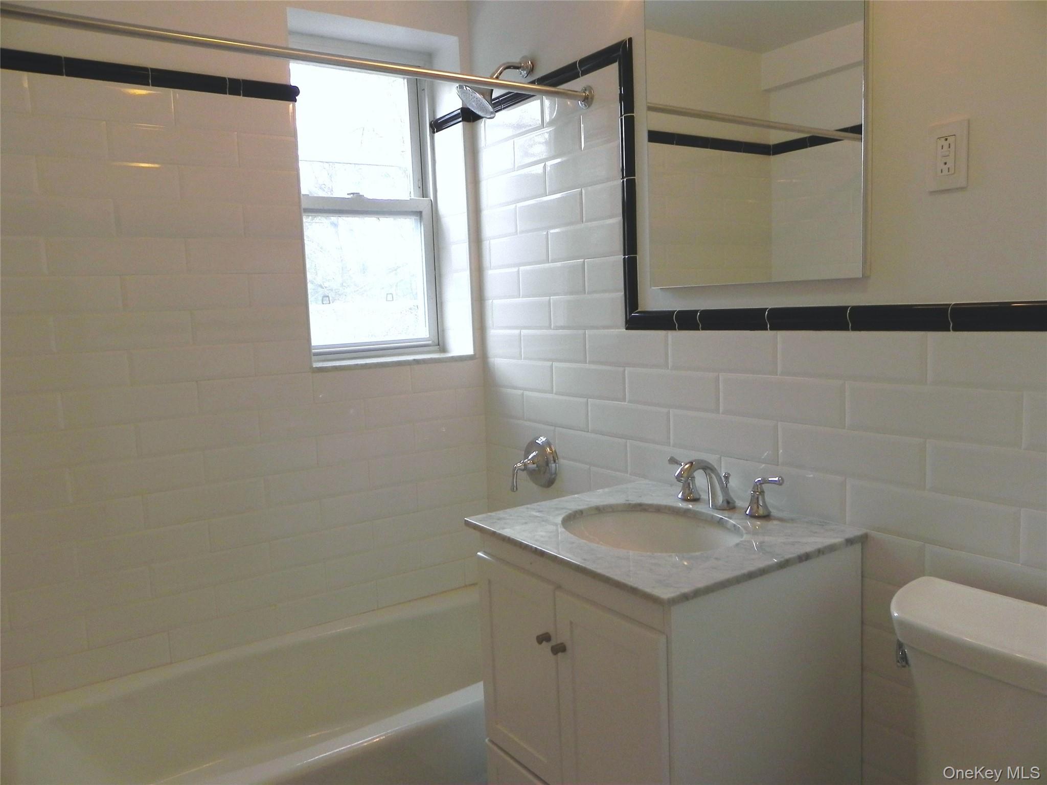160 South Middle Neck Road, Unit 1N Great Neck, NY 11021 - Photo 14 of 15 Renovated full bathroom