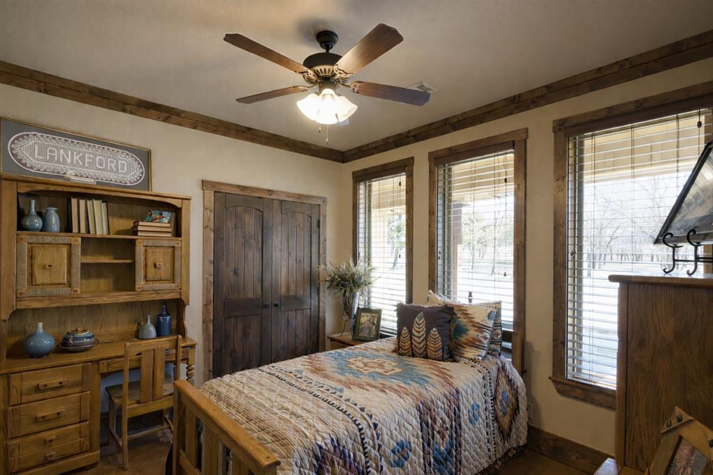 1011 Red Road Howe, TX 75459 - Photo 22 of 39 a bedroom with a large bed and a window