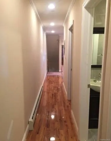 a view of hallway with shower