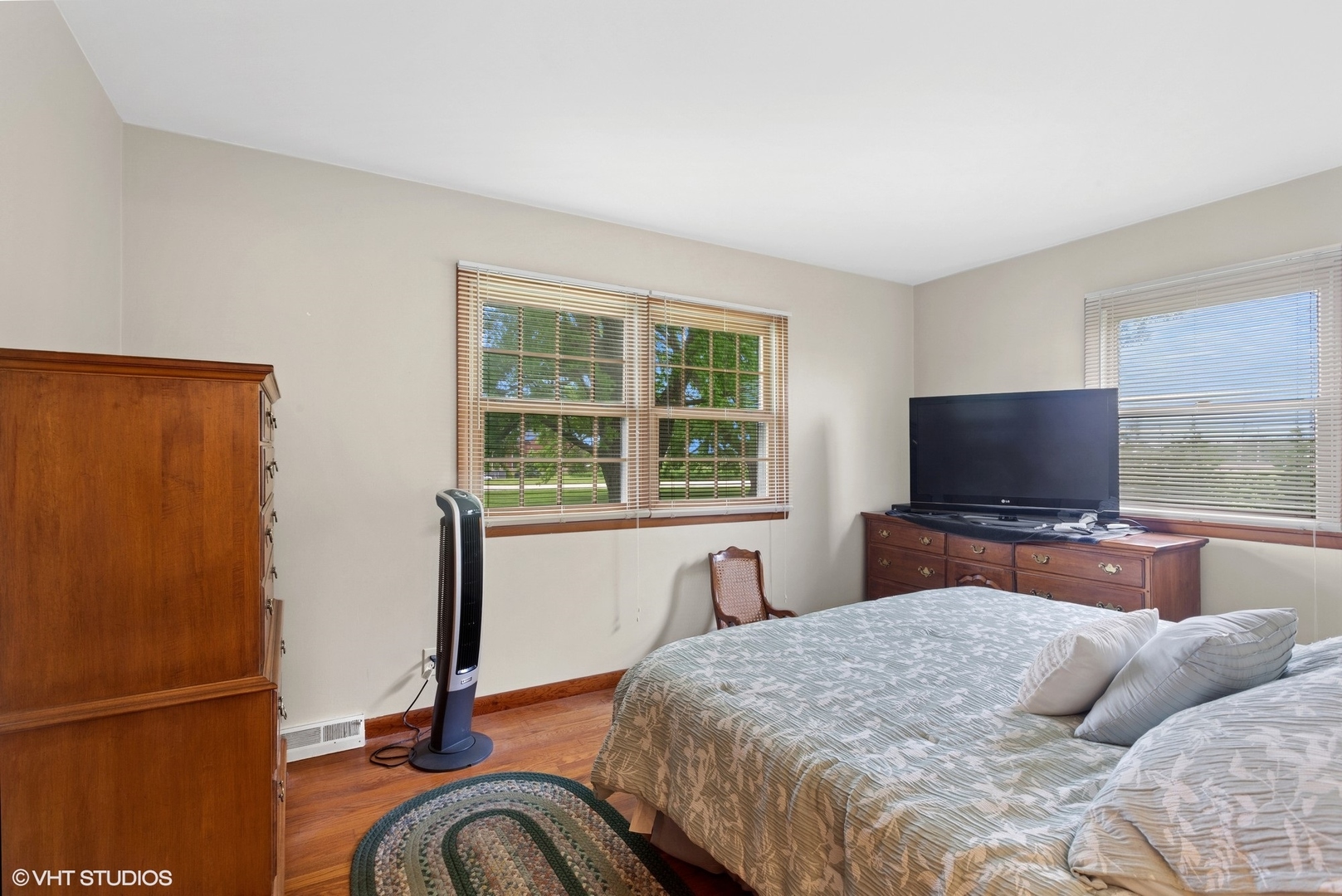 43W888 Hughes Road Elburn, IL 60119 - Photo 13 of 25 a bedroom with a bed and a flat screen tv