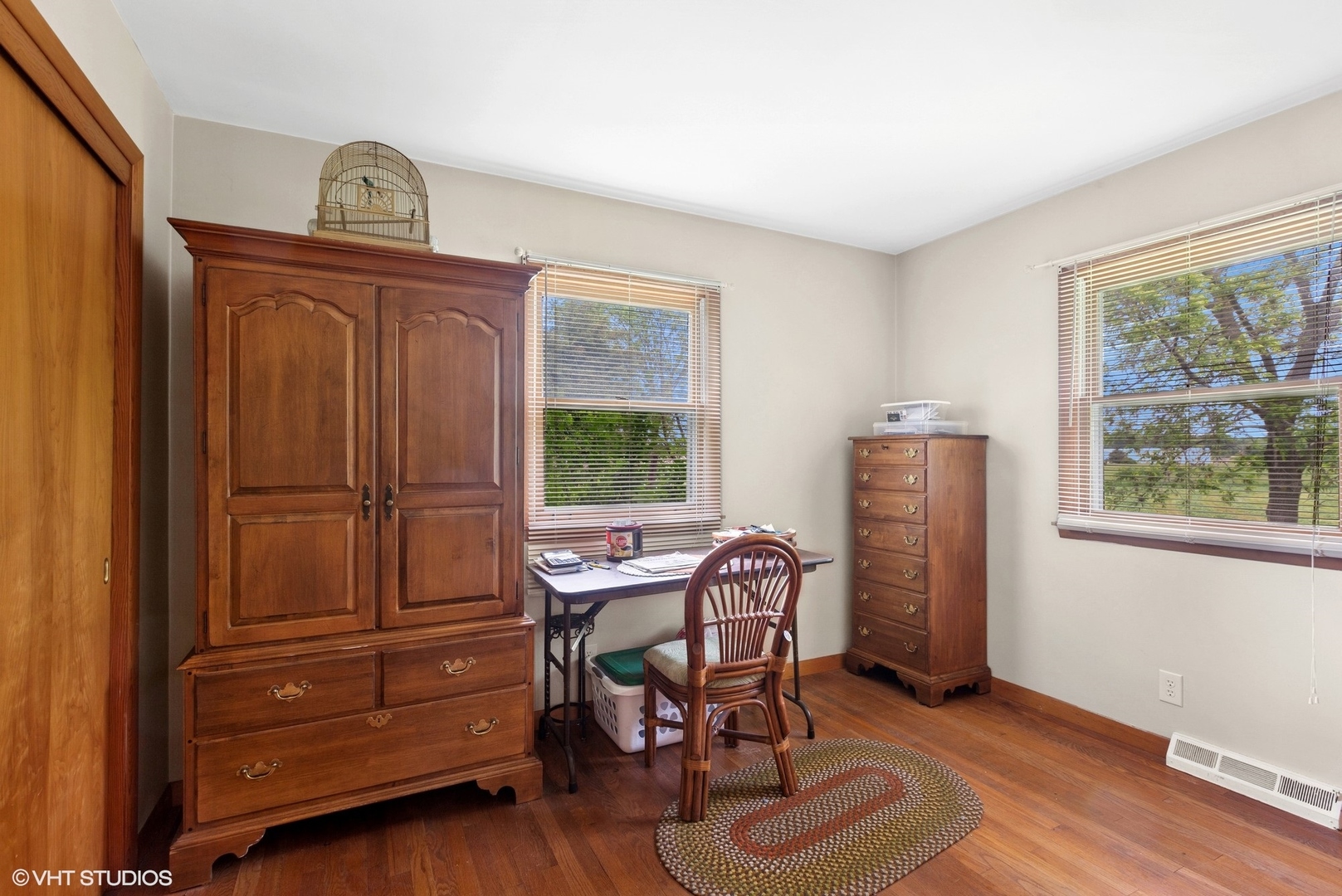 43W888 Hughes Road Elburn, IL 60119 - Photo 14 of 25 a view of a workspace with furniture and a window