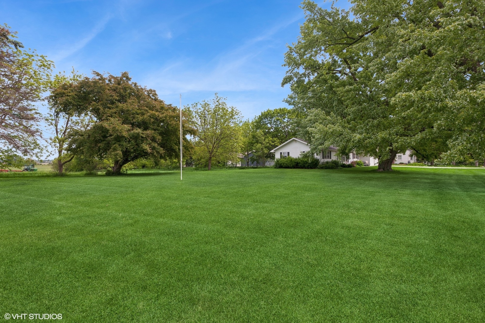 43W888 Hughes Road Elburn, IL 60119 - Photo 16 of 25 a view of a field with trees