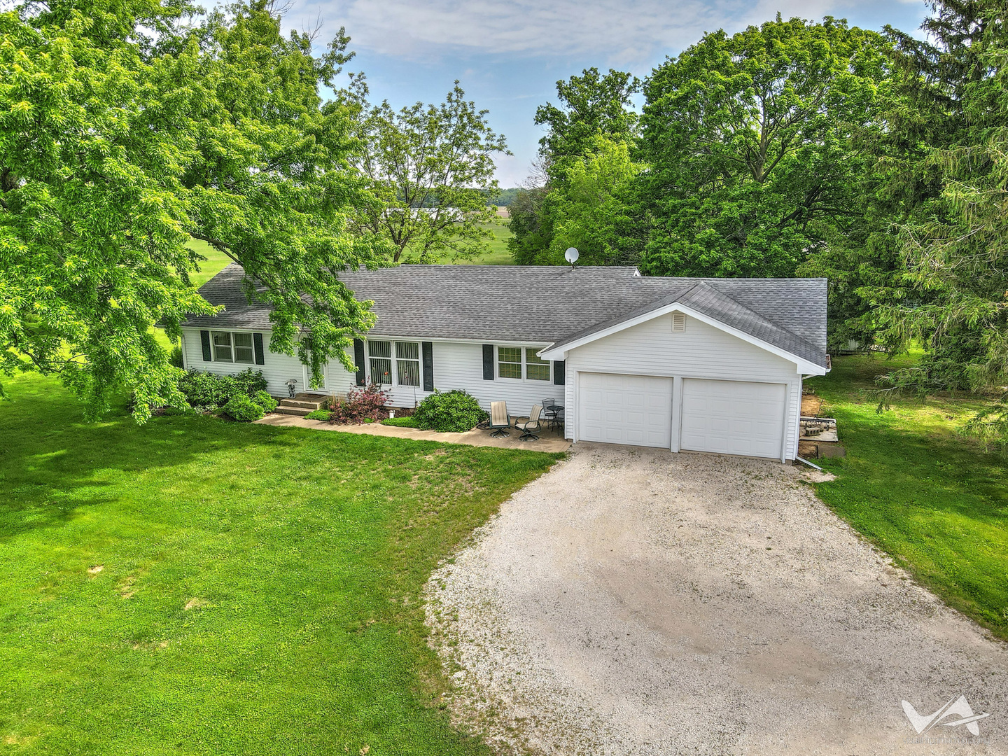 43W888 Hughes Road Elburn, IL 60119 - Photo 2 of 25 a front view of a house with a yard and trees