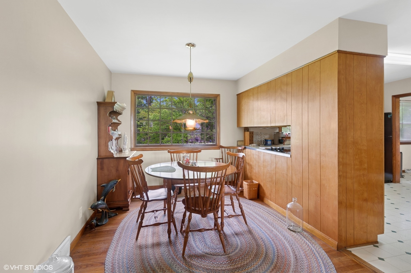 43W888 Hughes Road Elburn, IL 60119 - Photo 6 of 25 a view of a dining room with furniture window and wooden floor