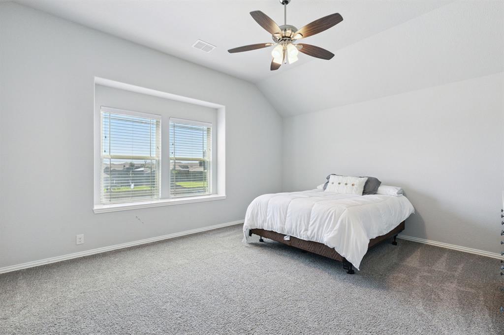 1620 Irene Drive Crowley, TX 76036 - Photo 31 of 36 a bed room with a bed and a window