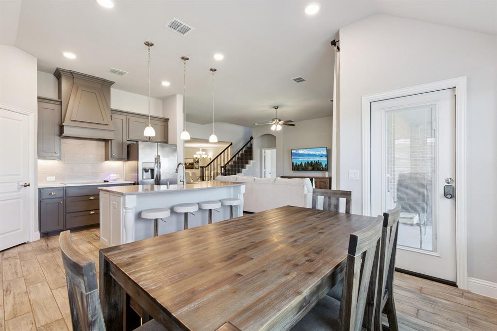 1620 Irene Drive Crowley, TX 76036 - Photo 10 of 36 a view of kitchen with cabinets and wooden floor