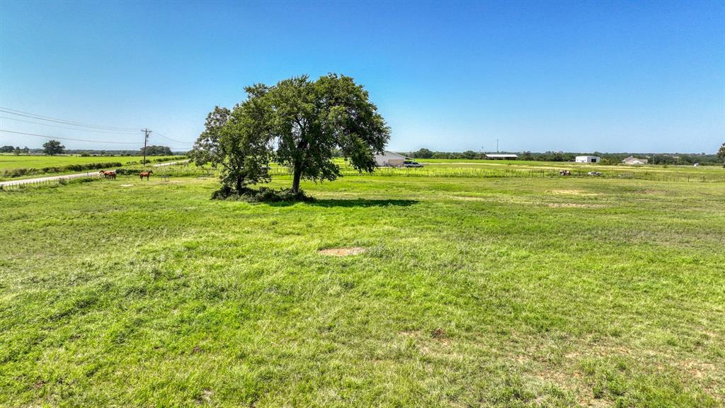 2701 Powell Cemetery Road Tolar, TX 76476 - Photo 18 of 18 a view of an ocean and a yard