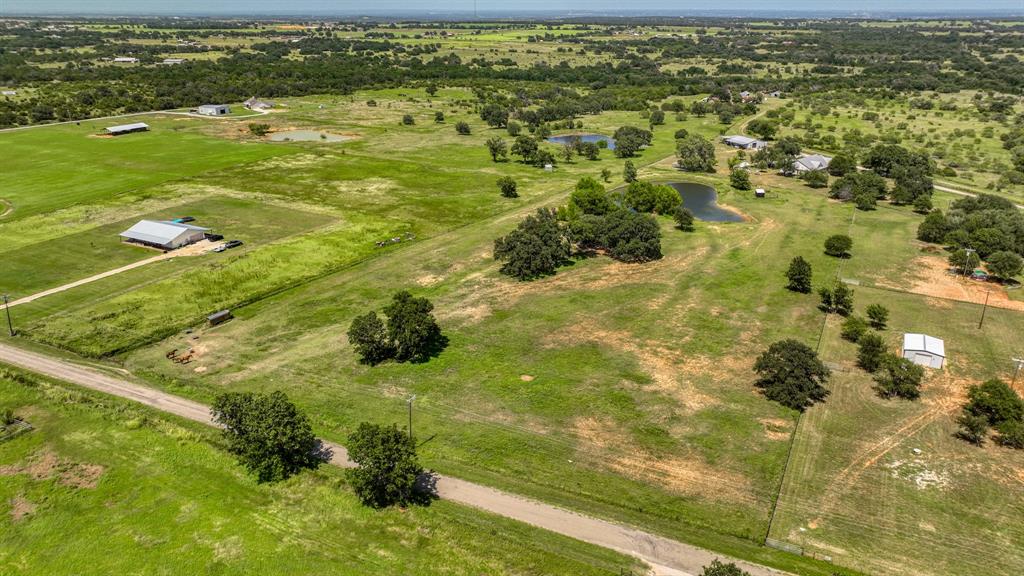 2701 Powell Cemetery Road Tolar, TX 76476 - Photo 3 of 18 a view of a lake from a yard