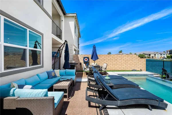 a backyard of a house with seating space
