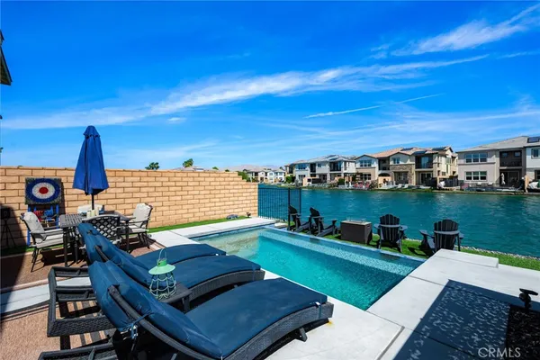 a backyard of a house with seating space