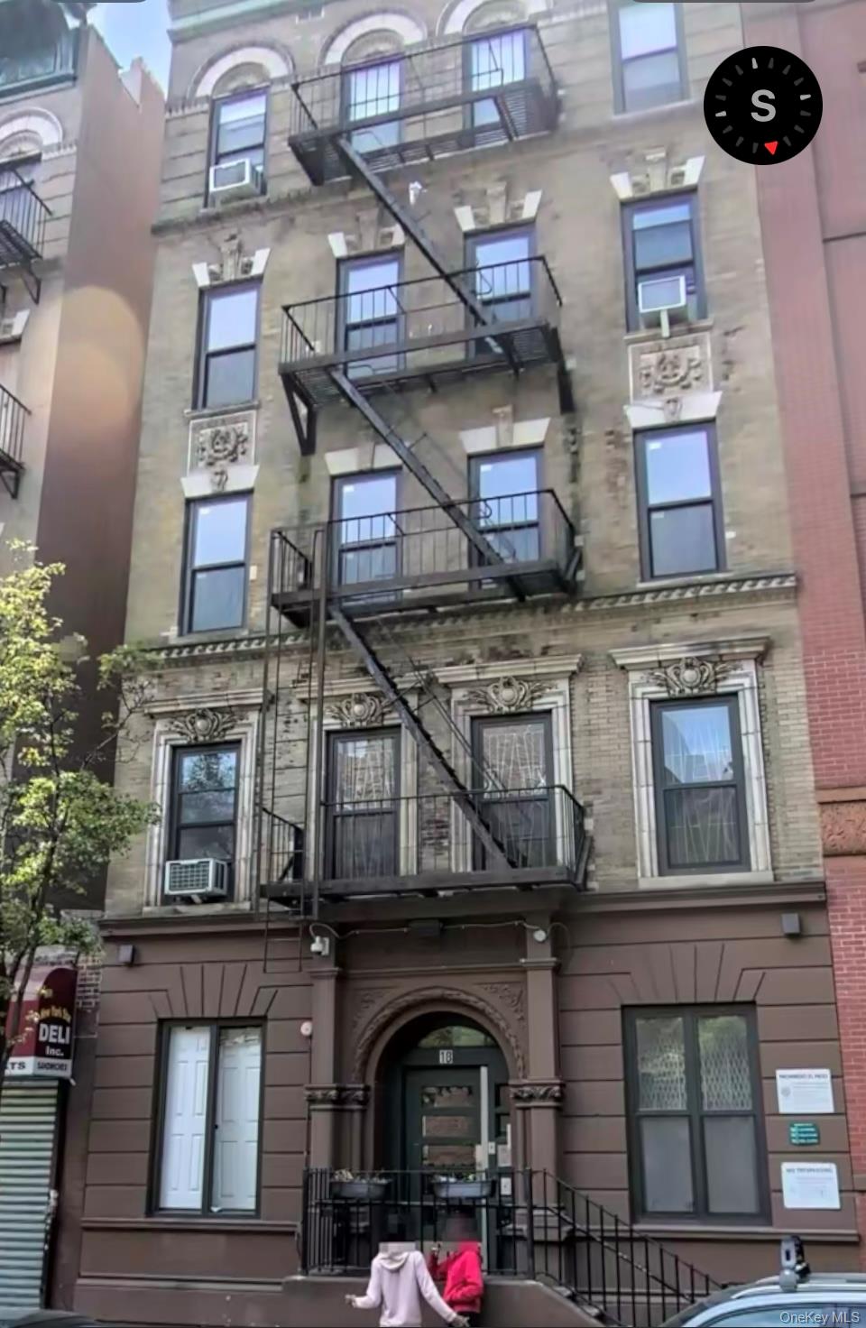18 East 132nd Street, Unit 3A Manhattan, NY 10037 - Photo 1 of 11 a front view of a building with entryway