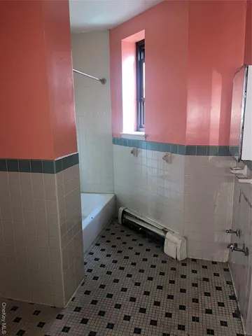 a bathroom with a sink a toilet a mirror and vanity