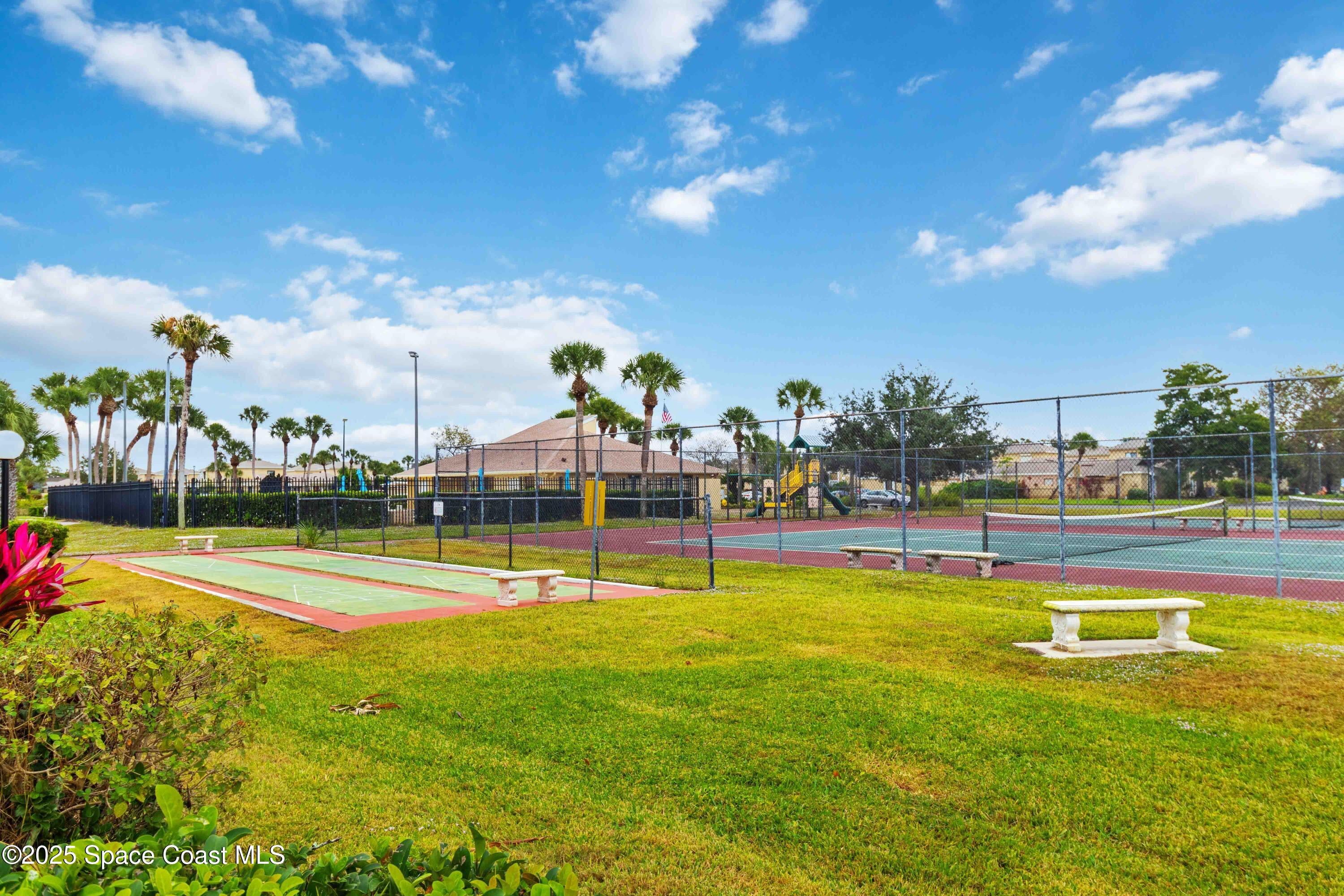 1020 Abada Court Northeast, Unit 103 Palm Bay, FL 32905 - Photo 23 of 26 a view of an swimming pool and an outdoor space