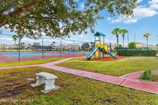 a view of a park with swings