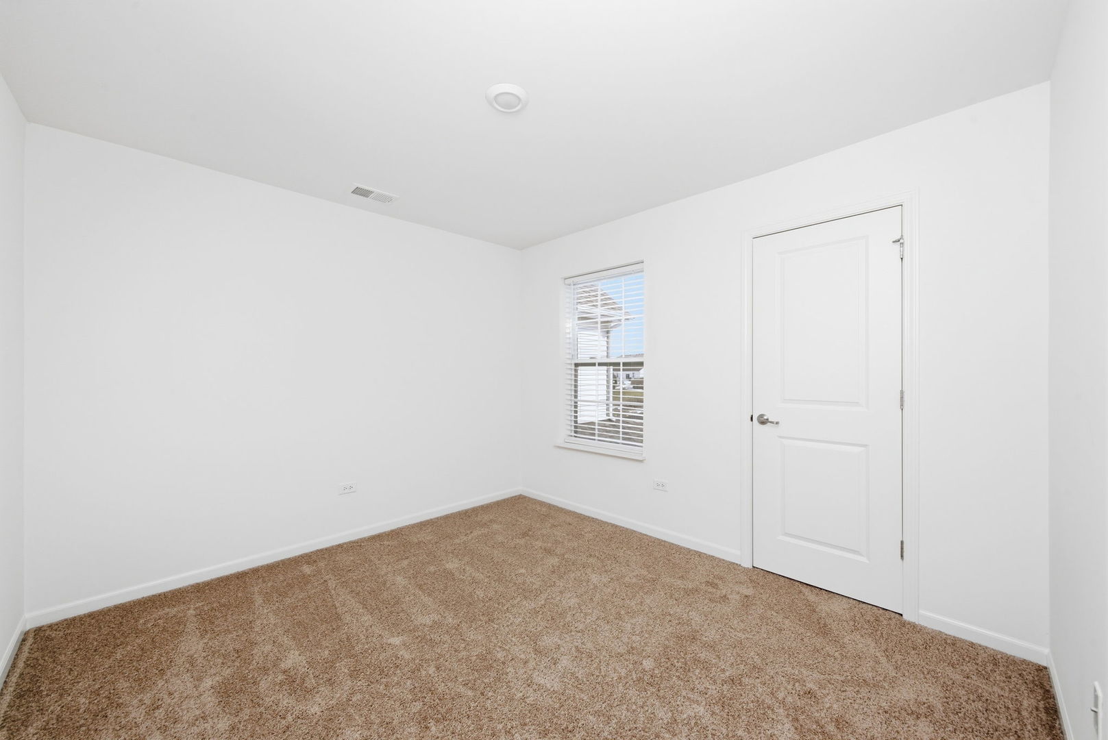 2017 Pembridge Lane Joliet, IL 60431 - Photo 13 of 19 a view of a room that has a window in it