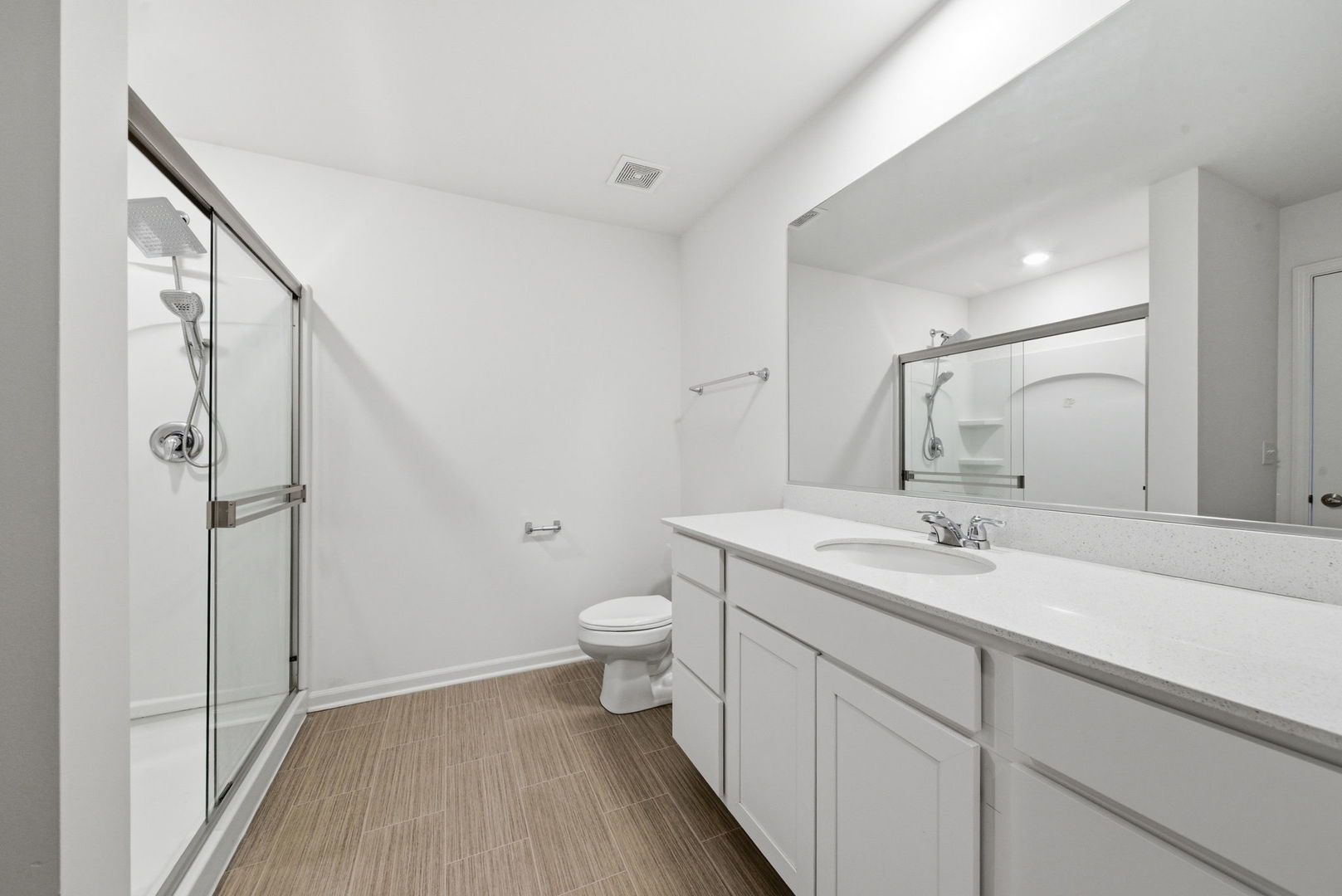 2017 Pembridge Lane Joliet, IL 60431 - Photo 17 of 19 a bathroom with a granite countertop sink toilet and shower