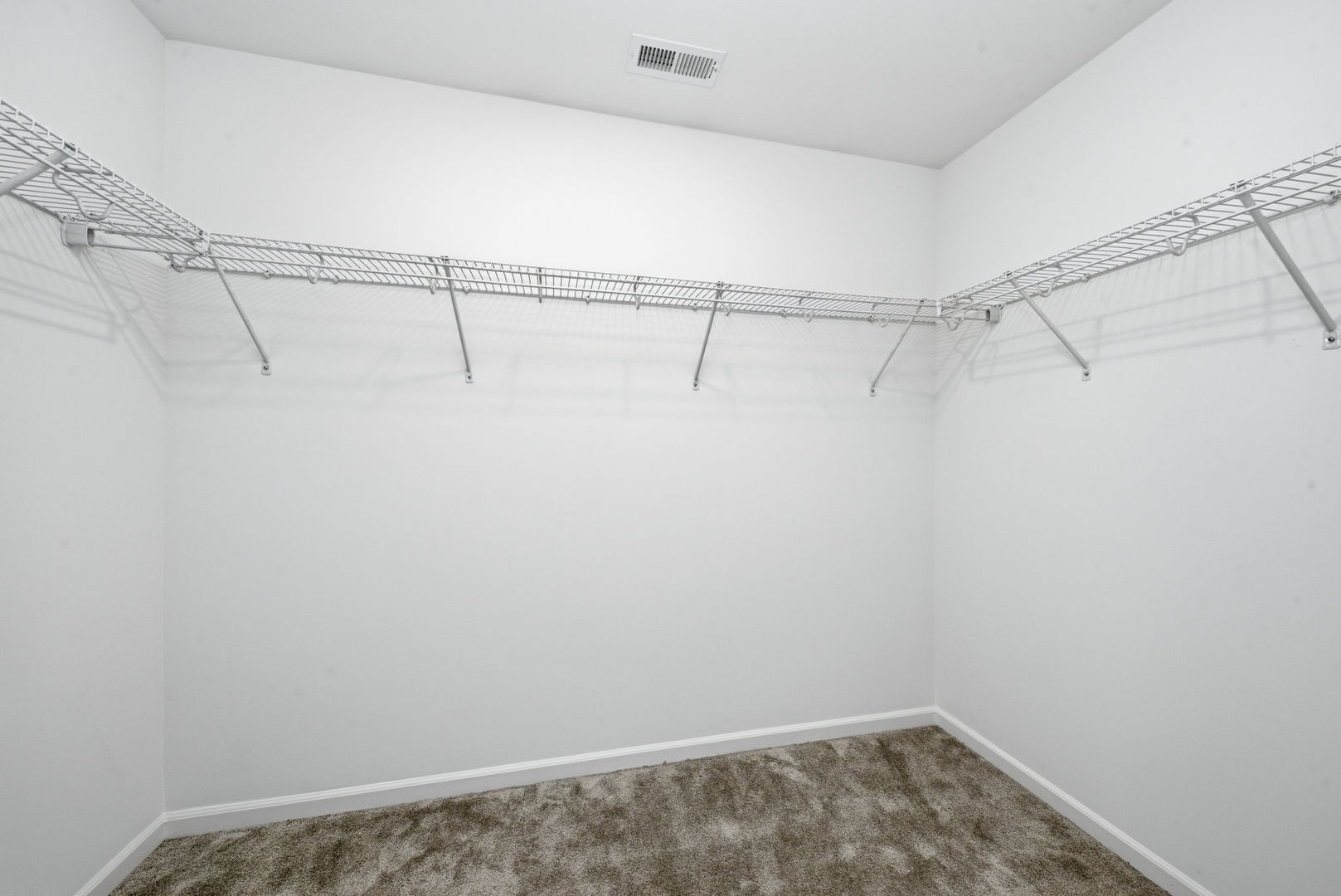 2017 Pembridge Lane Joliet, IL 60431 - Photo 19 of 19 a view of a room with racks on the wall