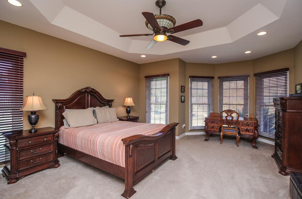 2619 Cooks Road Mount Juliet, TN 37122 - Photo 14 of 30 a bedroom with a bed a couch and a large window