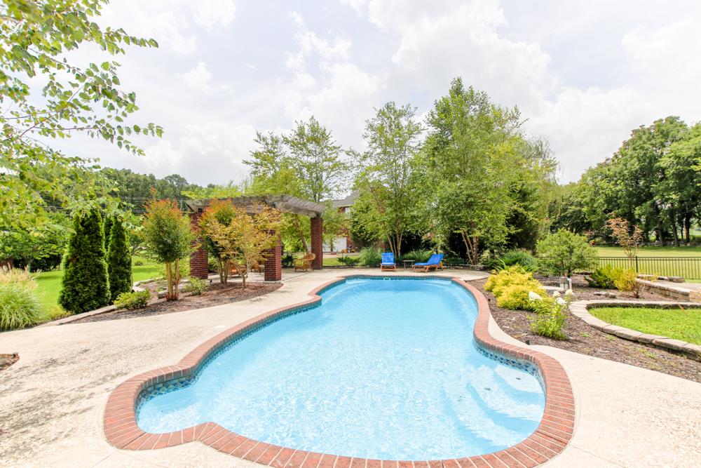 2619 Cooks Road Mount Juliet, TN 37122 - Photo 29 of 30 a swimming pool with outdoor seating and yard