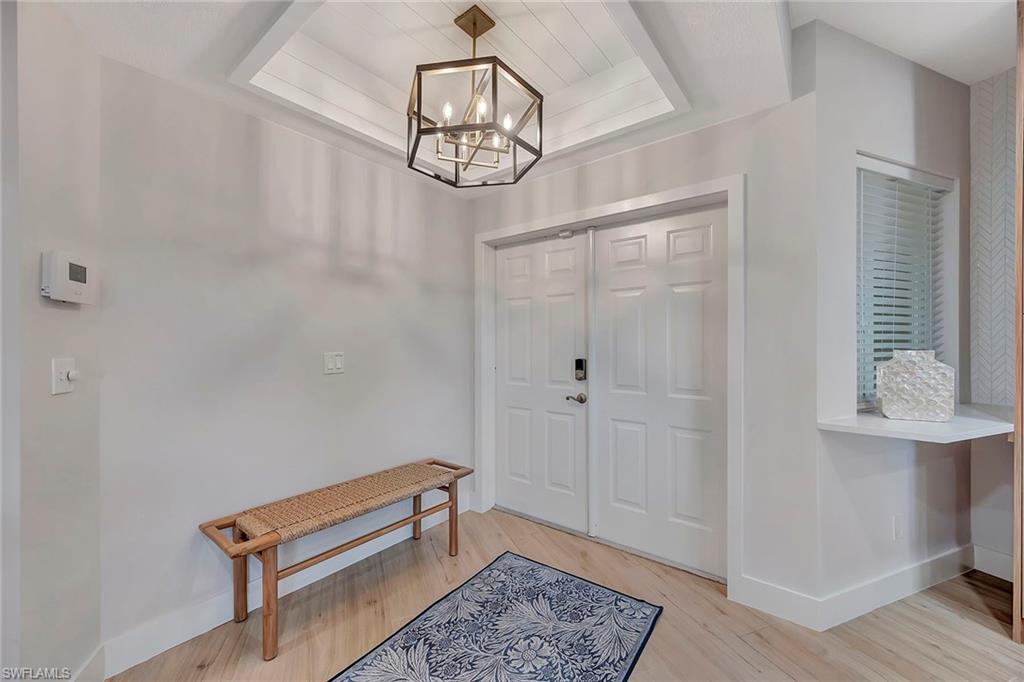 7671 Pebble Creek Circle, Unit 303 Naples, FL 34108 - Photo 15 of 28 Foyer