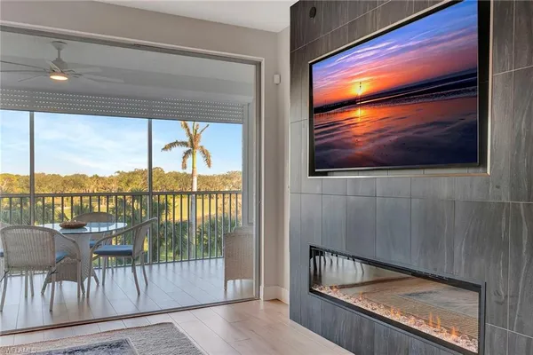 a view of roof deck with furniture