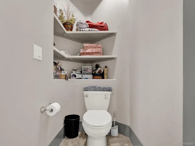 a kitchen with a table and chairs in it