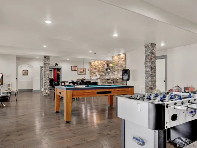 a room with furniture and a flat screen tv