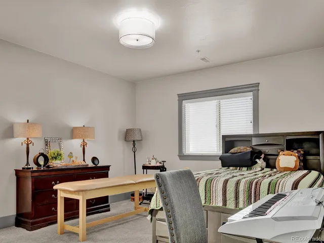 a view of a chairs and table in a patio