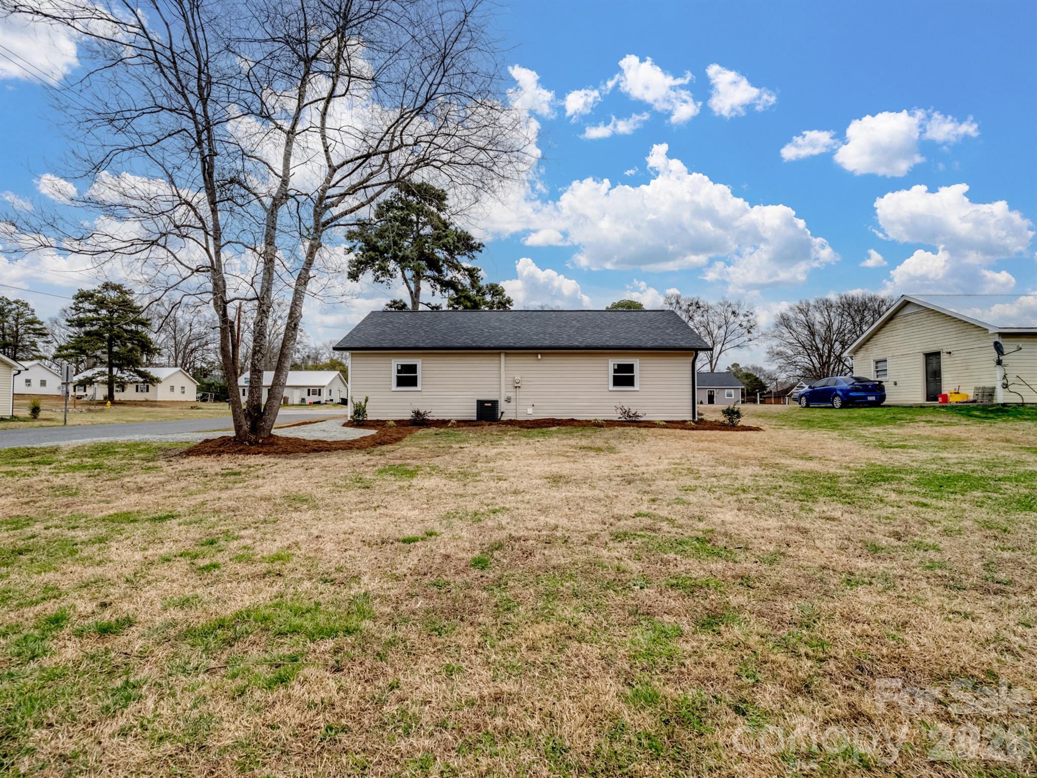 307 Jones Street Monroe, NC 28110 - Photo 3 of 22 a house view with a garden space