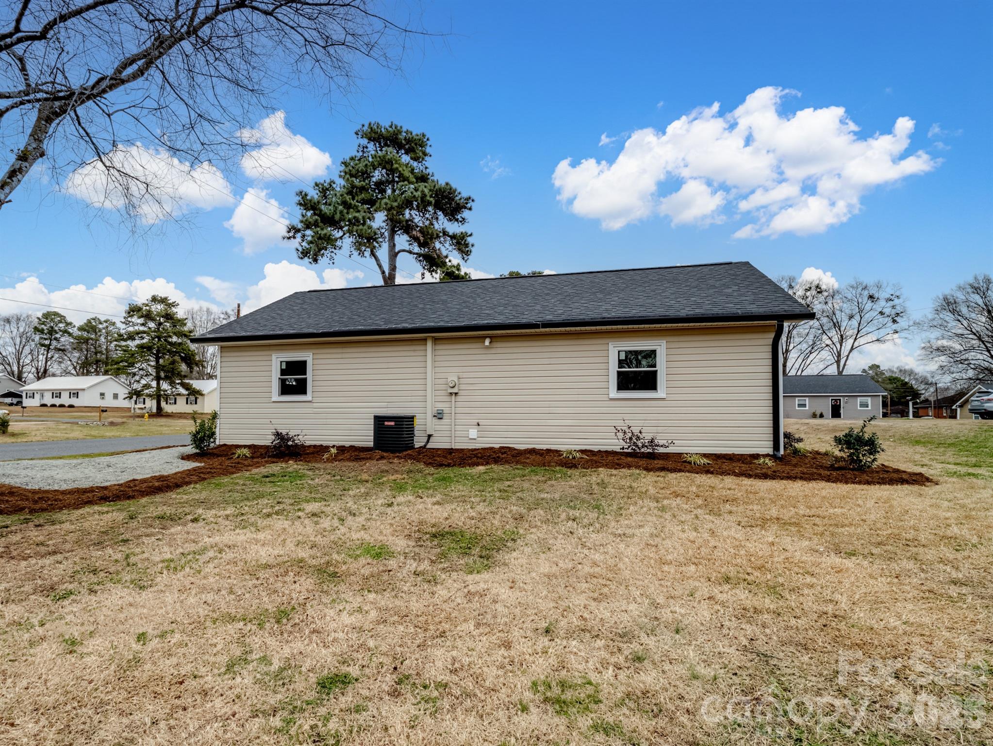 307 Jones Street Monroe, NC 28110 - Photo 4 of 22 a view of a house with a yard