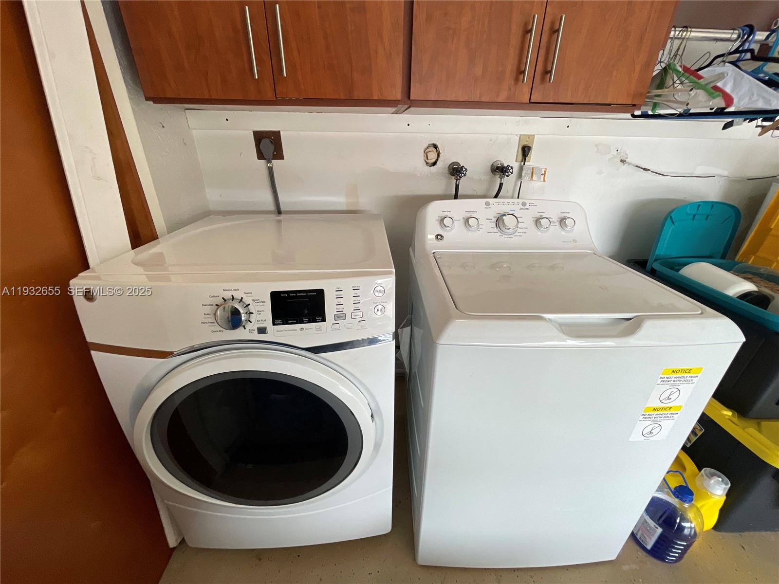 8951 Southwest 16th Street Boca Raton, FL 33433 - Photo 7 of 7 a utility room with dryer and washer