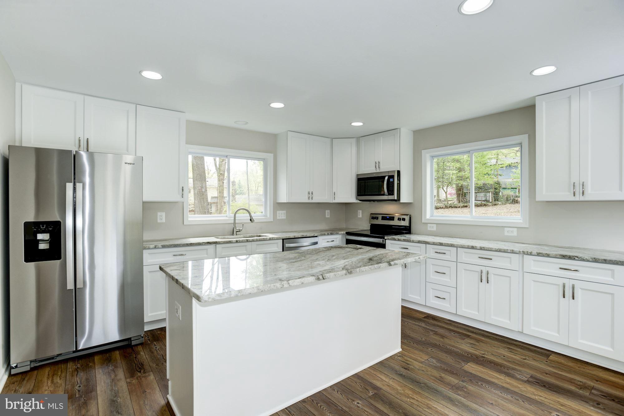 8820 Trafalgar Court Springfield, VA 22151 - Photo 23 of 51 Kitchen-Island Breakfast Bar Recessed Lighting