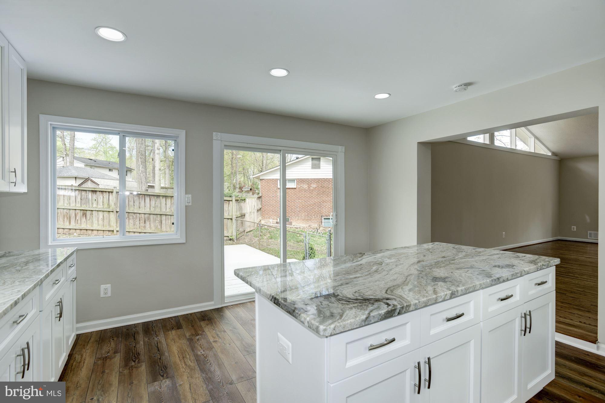 8820 Trafalgar Court Springfield, VA 22151 - Photo 25 of 51 Kitchen with Sliding Glass Door to Deck