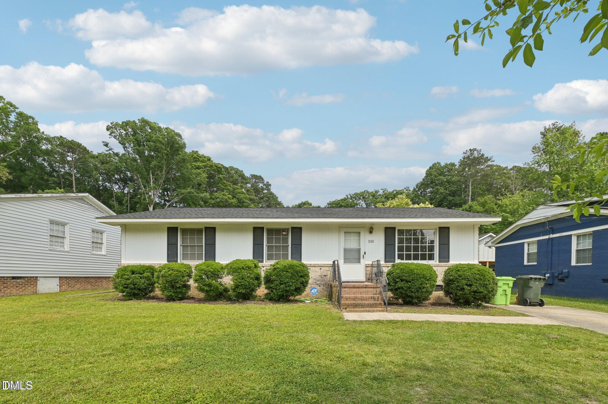 555 Dacian Road Raleigh, NC 27610 - Photo 1 of 16 a view of a house with a yard
