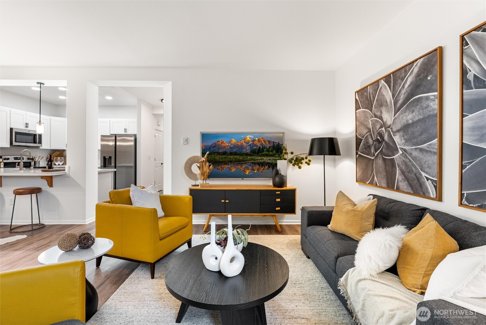 3957 South Chicago Street Seattle, WA 98118 - Photo 11 of 34 a living room with furniture and a dining table with wooden floor