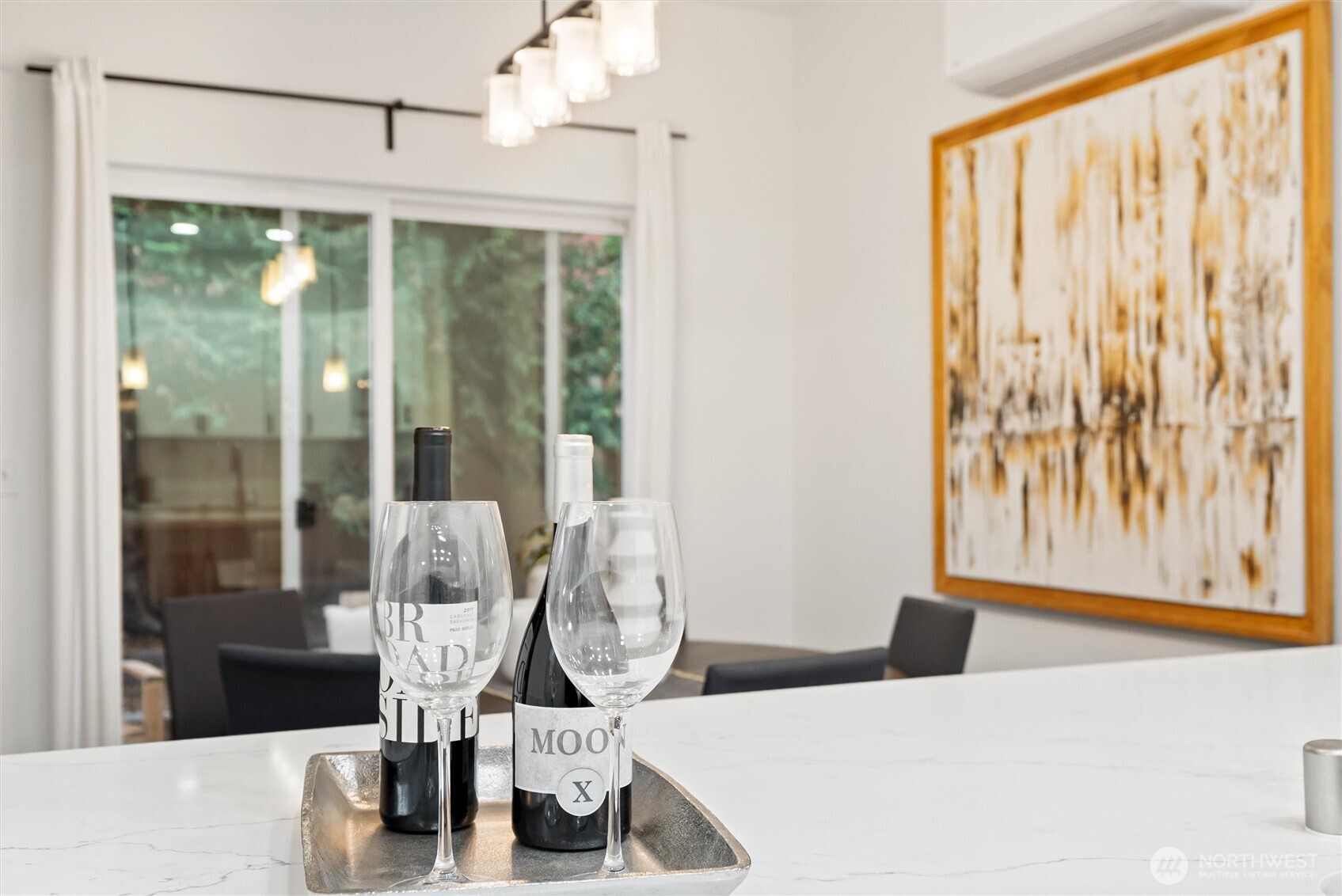3957 South Chicago Street Seattle, WA 98118 - Photo 14 of 34 a view of a living room with a large window and dinning table