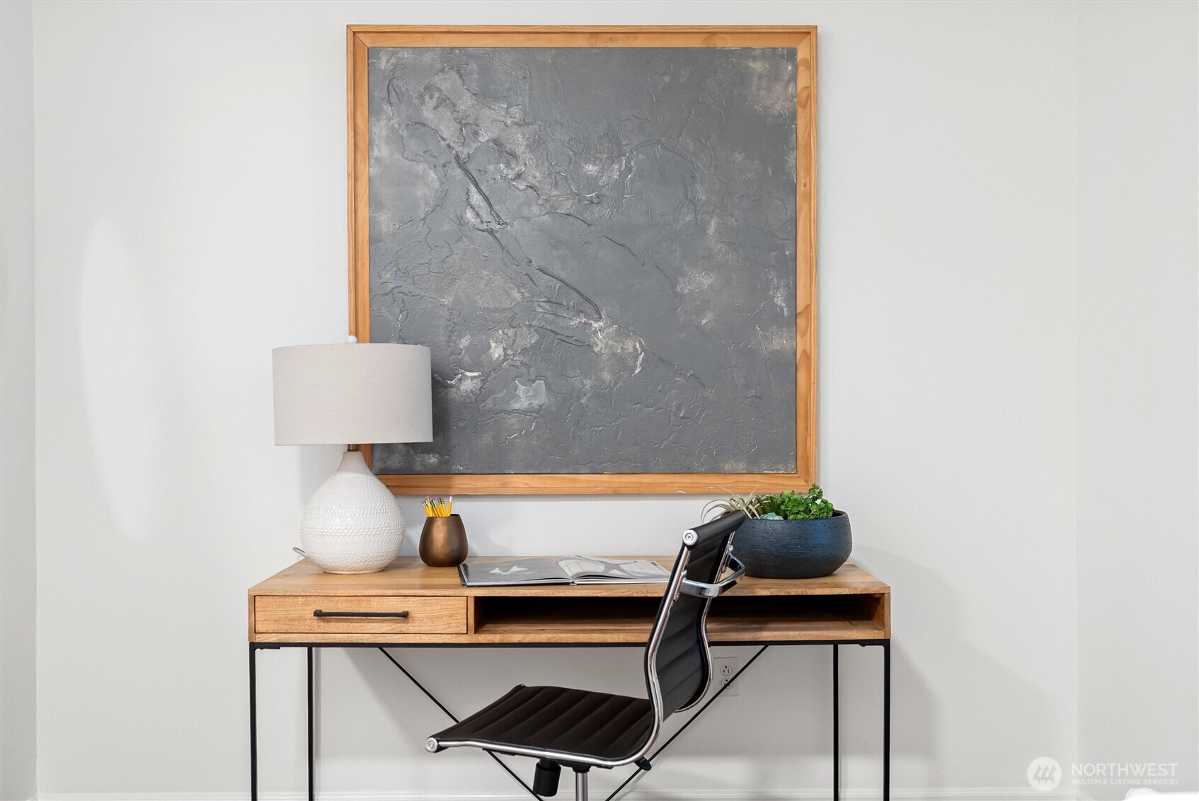 3957 South Chicago Street Seattle, WA 98118 - Photo 16 of 34 a room with a table and a potted plant