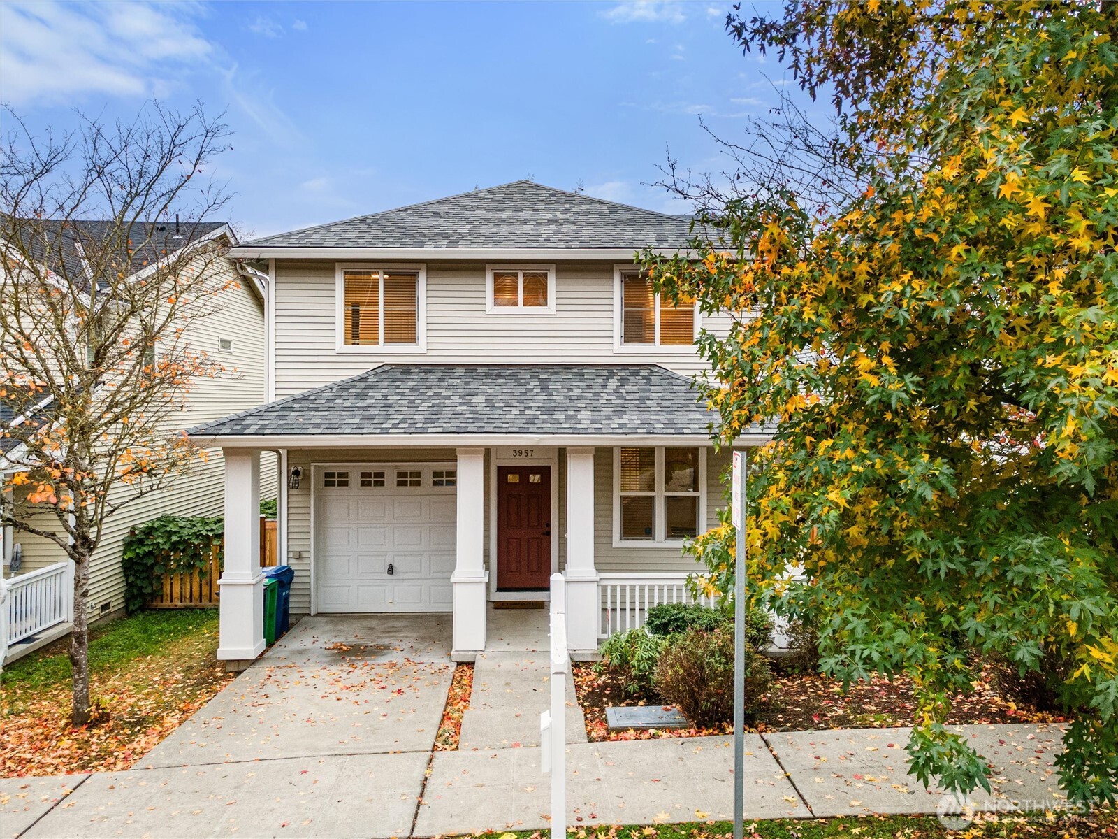 3957 South Chicago Street Seattle, WA 98118 - Photo 2 of 34 a front view of a house with a garden
