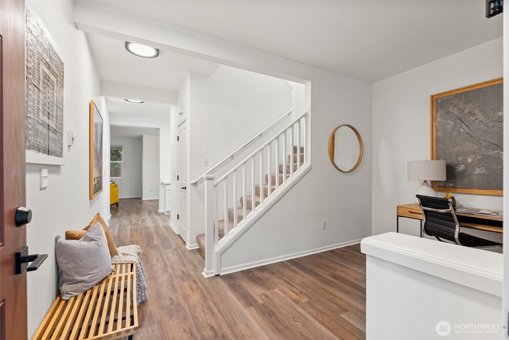 3957 South Chicago Street Seattle, WA 98118 - Photo 4 of 34 a view of entryway kitchen and hall with wooden floor