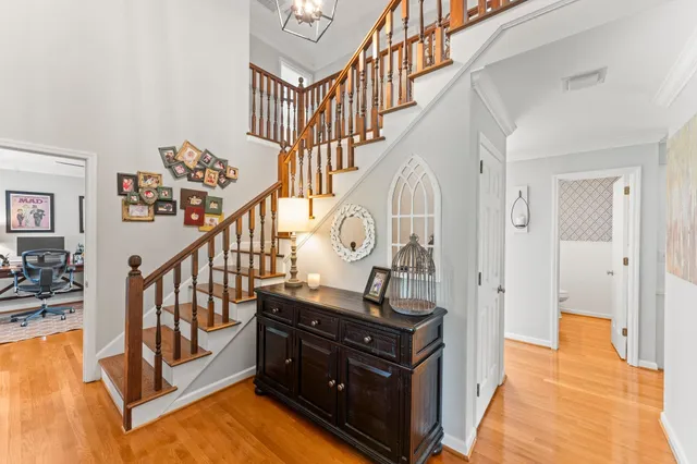 a view of a hallway with seating area