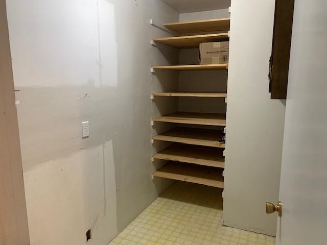 581-22 22 1/2 Road Grand Junction, CO 81507 - Photo 11 of 26 a view of walk in closet with empty racks
