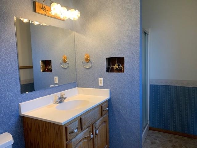 581-22 22 1/2 Road Grand Junction, CO 81507 - Photo 18 of 26 a bathroom with a sink vanity and a mirror